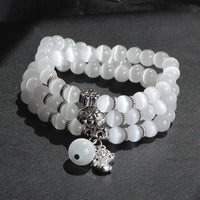 Dreifach wickelbares PiXiu-Support-Armband mit Katzenaugen-Motiv von KarmaRipple