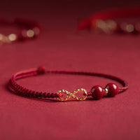 KarmaRipples Cinnabar Blessing Fußkettchen mit rotem Band und Unendlichkeitssymbol aus 14 Karat Gold