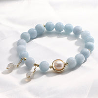 KarmaRipples Talisman-Armband mit Aquamarinperlen und ausgleichenden Mondsteinperlen
