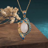 KarmaRipples Halskette mit Segensanhänger aus elfenbeinfarbener Jade und Pfauenbronze