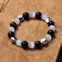 KarmaRipples schwarzes Obsidian-Katzenauge-Yin-Yang-Reinigungsstärke-Armband