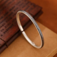 KarmaRipples Vintage-Armreif aus 999er Sterlingsilber mit glückverheißendem Wolken-Design