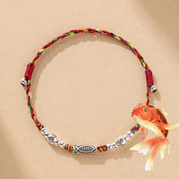 KarmaRipple's Fußkettchen aus 925er Sterlingsilber mit gewebtem, buntem Koi-Fisch