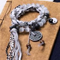 KarmaRipples Armband mit schwarzem Glitzerstein, Katzenauge, Yin Yang, Berggeister, Geld ausgeben, Macht, doppellagiges Seil