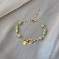 KarmaRipples einzigartiges, authentisches Hetian-Jade-Armband mit 14 Karat Goldfüllung und Glücksperlen
