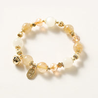 KarmaRipples 14 Karat vergoldetes Armband mit goldenem Rutilquarz, Reichtumsglocke, Glücksbringer