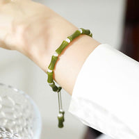 KarmaRipples authentisches Peridot-Bambus-Muster Love Peace-Armband