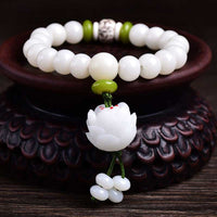 KarmaRipples Lotus-Armband aus echtem Elfenbein mit Bodhi-Samen 