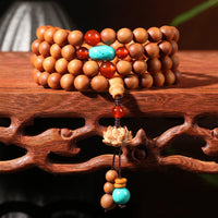 KarmaRipples tibetisches Sandelholz-Lotus-Erleuchtungs-Talisman-Mala-Armband
