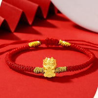 KarmaRipples 999 Sterling Silber Jahr des Drachen Bronzemünze Glücksdrache Fu Charakter Glück Handgefertigtes gewebtes Armband aus roter Schnur