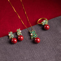 KarmaRipple's Set mit Anhänger, Halskette, Ohrringen und Ring, Sterling-Silber 925, vergoldet, Zinnoberperlen, Blumensegen