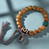 KarmaRipples authentisches tibetisches Kamelknochen-Hakenkreuz-Dzi-Perlen-Shankha-Buddha-Talisman-Kirtimukha-Glücksschutz-Quastenarmband