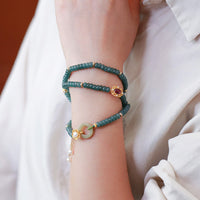 KarmaRipples dreifach wickelbares Armband aus 925er Sterlingsilber mit vergoldeter Cyan-Jade-Blume und Peace-Schnalle