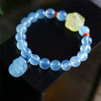 KarmaRipples authentisches Pixiu-Armband mit friedensausgleichendem Aquamarin und Bernstein